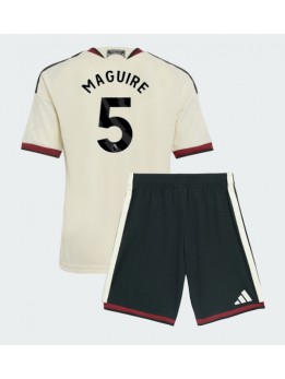 Otroški Nogometna dresi replika Manchester United Harry Maguire #5 Tretji 2026-27 Kratek rokav (+ hlače)